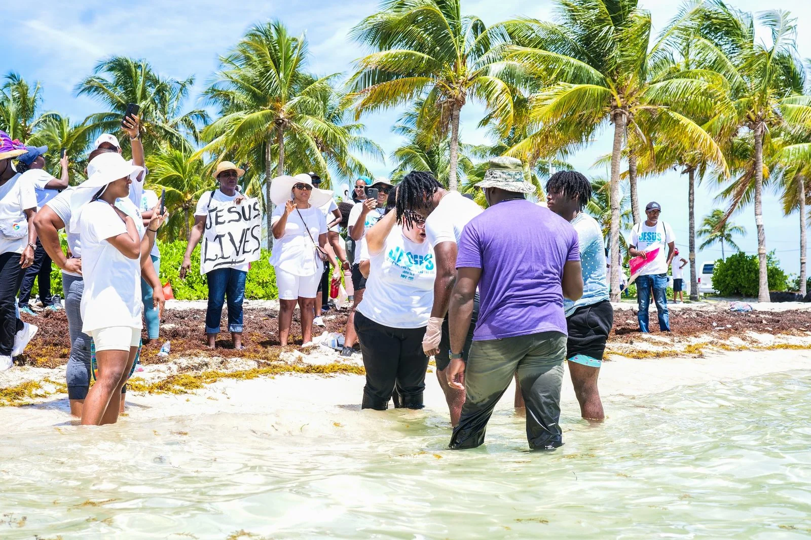 IOT volunteers gathering together near the beach.